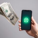 man showing smartphone with blank screen light grey background closeup money flying around 1199132 198436