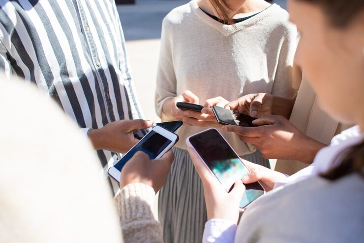 People using smartphones