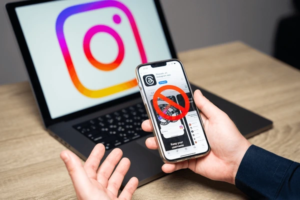 Instagram account suspended warning displayed on a smartphone screen